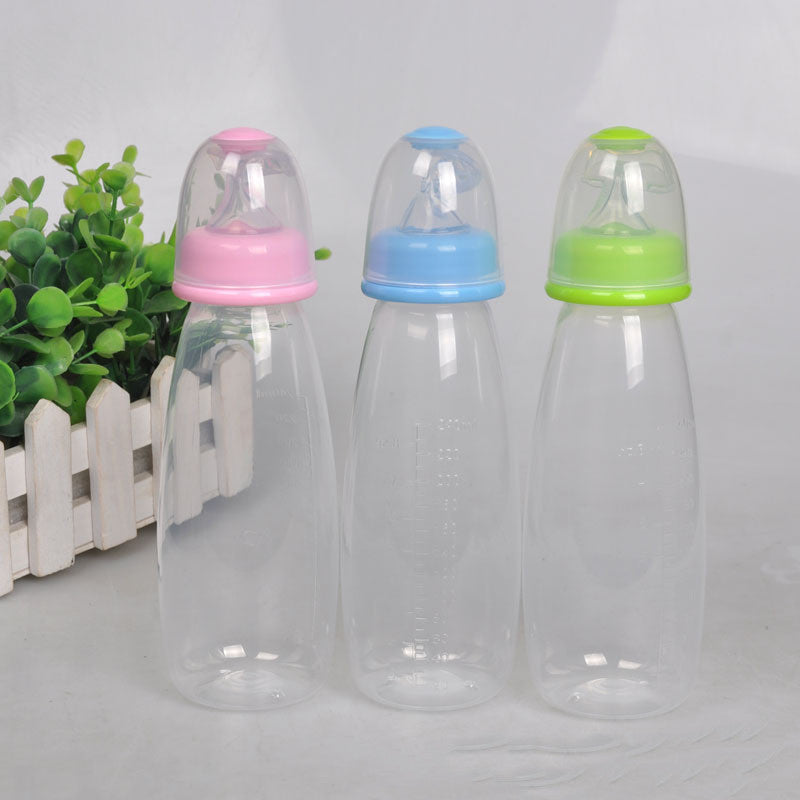 Babyflasche mit Löffel